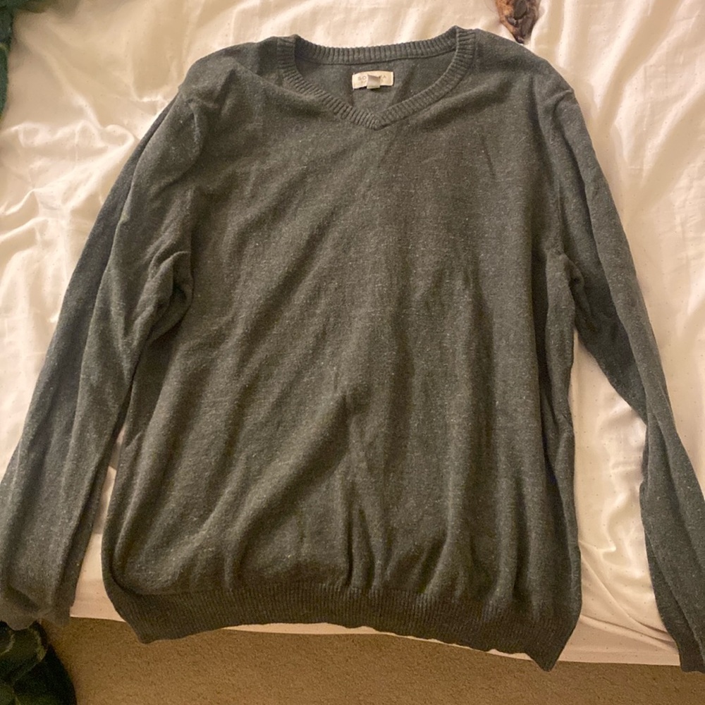 green v-neck sweater